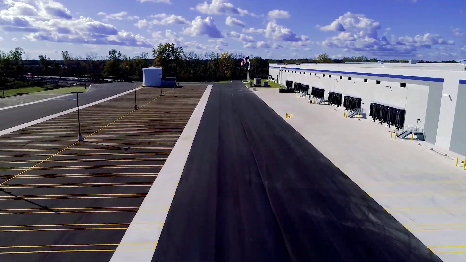 Staged trailers across the dock court — Ford redistribution center, Newport MI